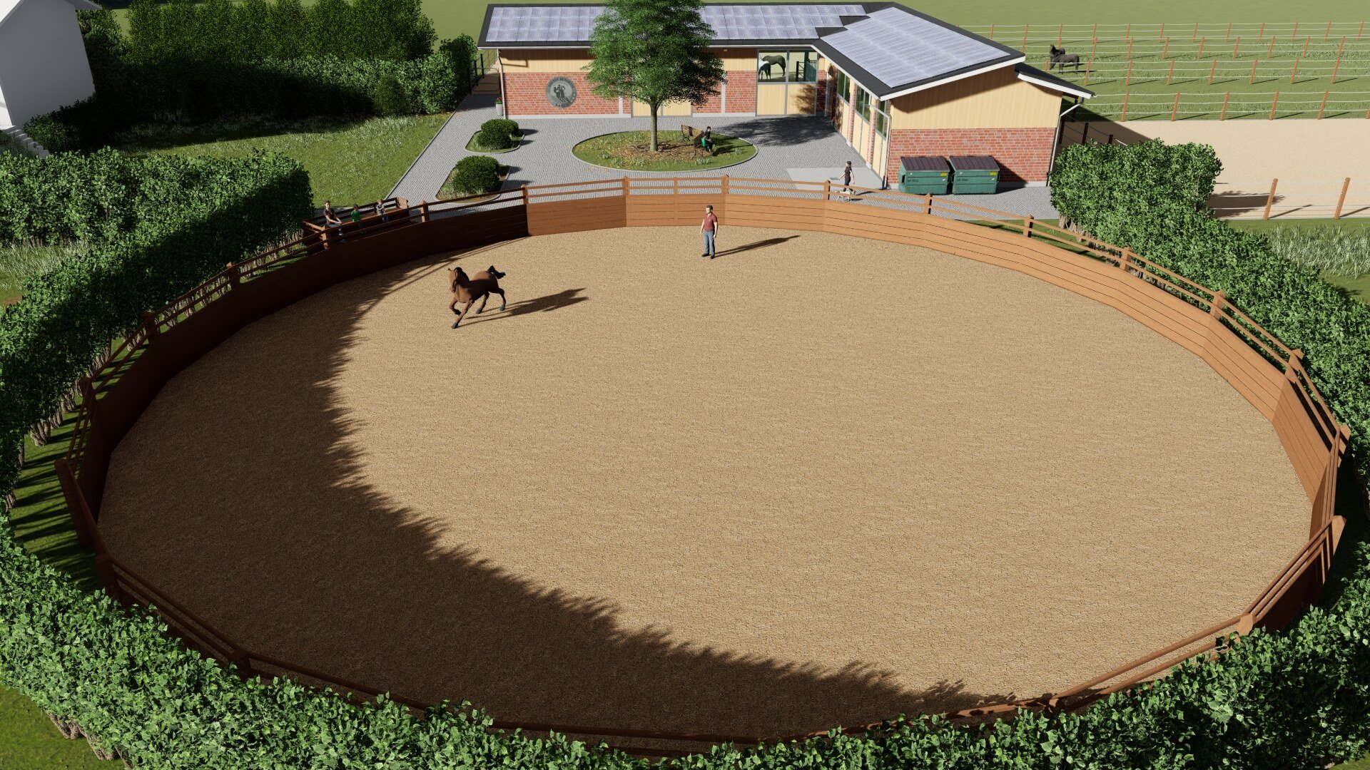 Übersicht über einen Roundpen für Pferde mit einem Trainer und Pferd in Aktion, integriert in eine größere Anlage mit Stallungen und Gebäuden im Hintergrund, entworfen von EQUUS DESIGN PLANUNG.